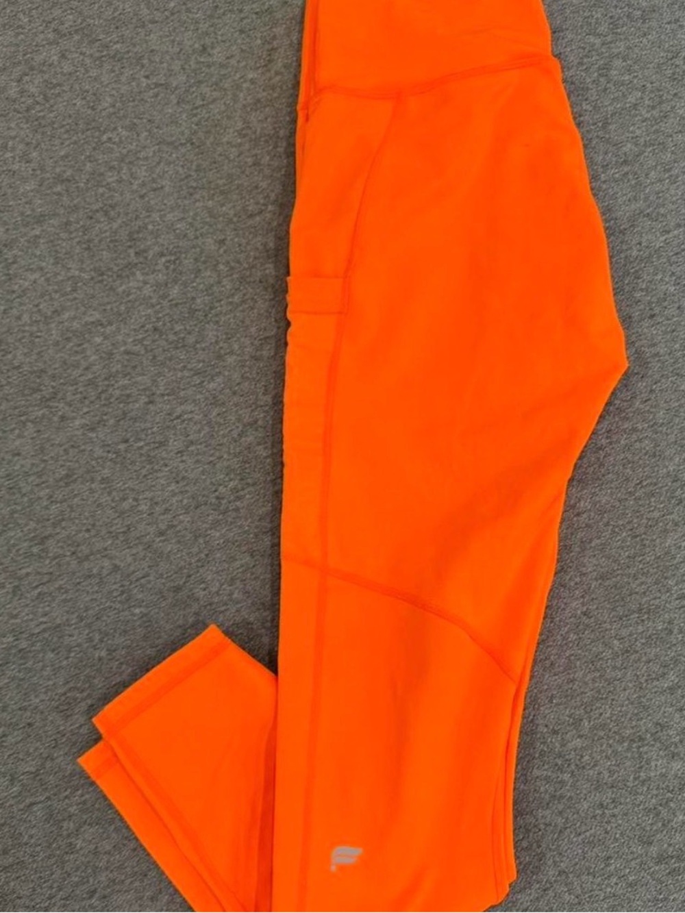 Fabletics Neon Orange PowerHold Leggings with mesh fabric ankle